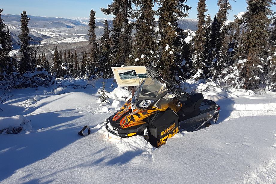 A snowmobile on the trail