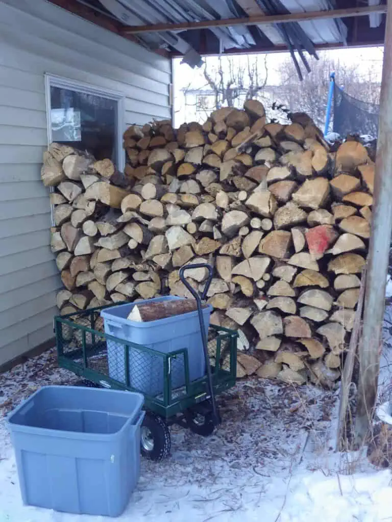 Firewood beside a house