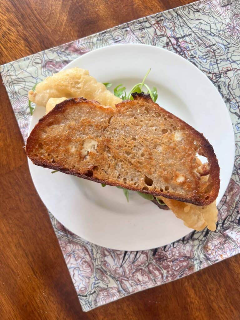 Fried Fish Sandwich With Arugula And Tartar Sauce