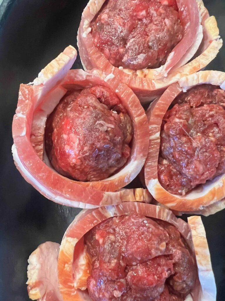 Place the wrapped meatballs in a pan