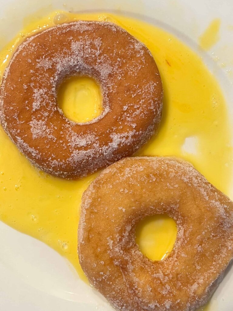 Soak the donuts in egg and eggnog